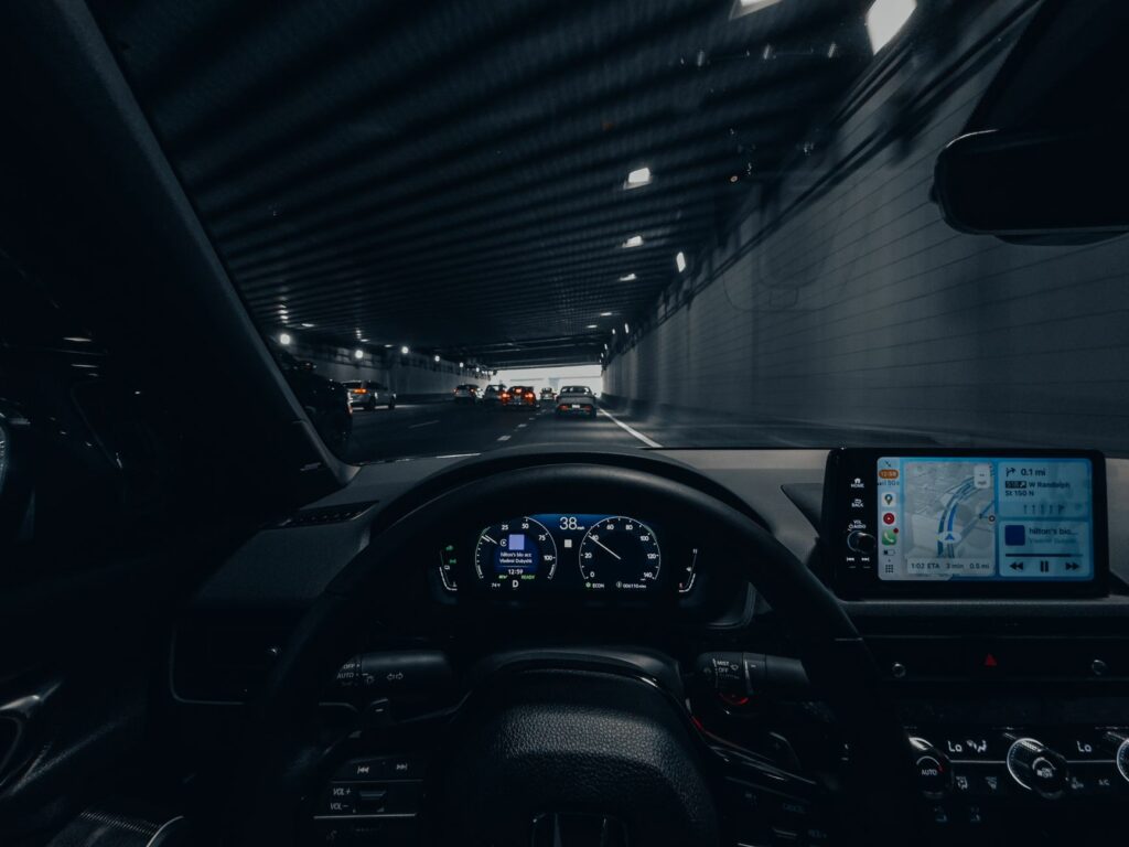 driving through city tunnel at night with gps